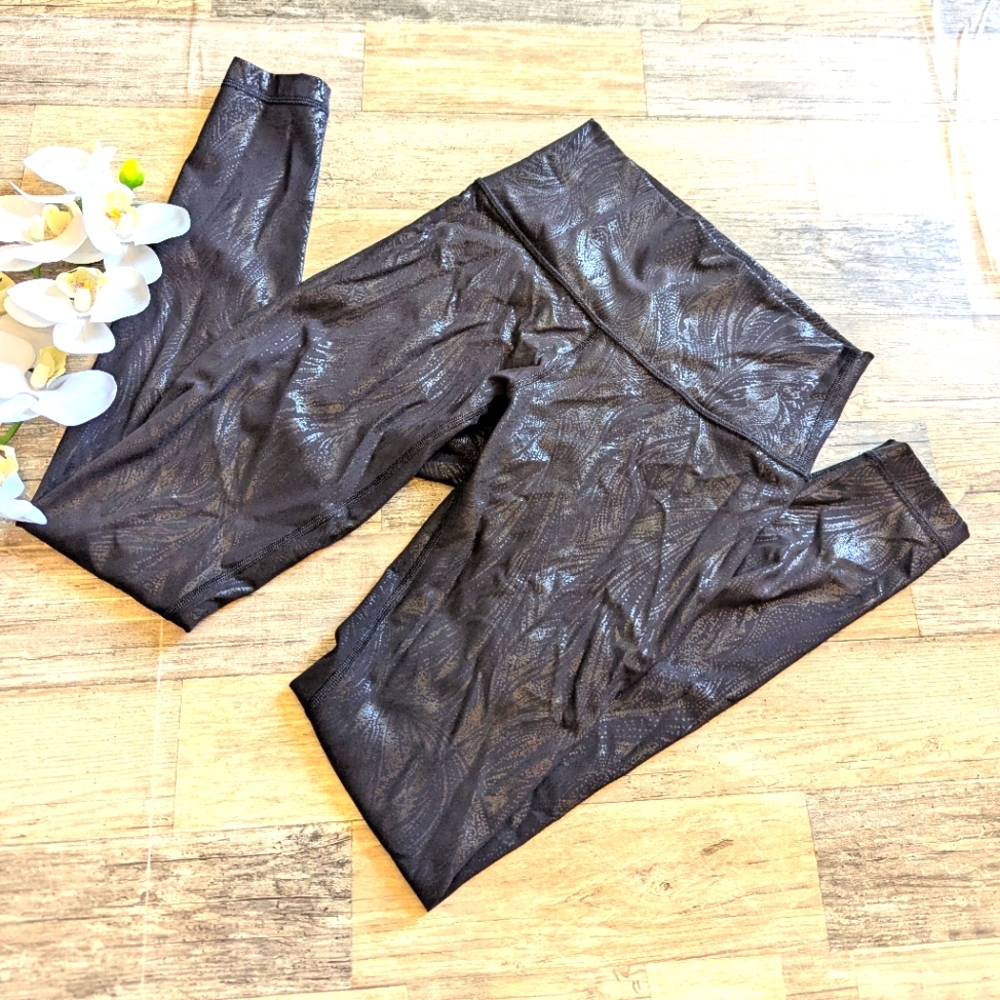 Lululemon black patterned leggings size 4 EUC